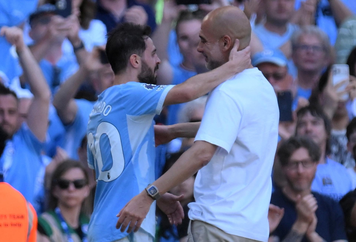 Bernardo Silva y Pep Guardiola