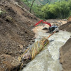 Maquinaria en el río Santo Domingo