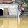 Zona afectada por inundaciones en el barrio Zarabanda, en Montería (Colombia). “Esto se demora”, dicen resignados los habitantes de los barrios bajos de Montería, capital de Córdoba.
