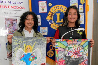 Fotos | Argemiro Idárraga | LA PATRIA Juan Bautista Vargas, del colegio Semenor, e Isabel Cárdenas, del colegio San Rafael, ganadores del concurso.