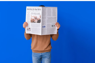 Persona leyendo un periodico