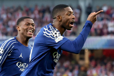 Ousmane Dembele del PSG celebra después de marcar el primer gol durante el partido de ida de las semifinales de la Liga de Campeones de la UEFA entre el Arsenal FC y el Paris Saint-Germain, en Londres, Gran Bretaña, este martes 29 de abril del 2025.