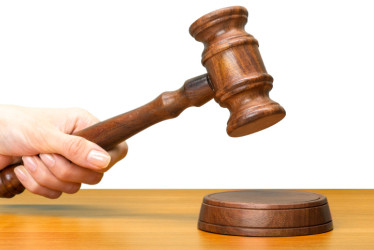 El magistrado habría favorecido a dos exfuncionarios investigados en Barranquilla.