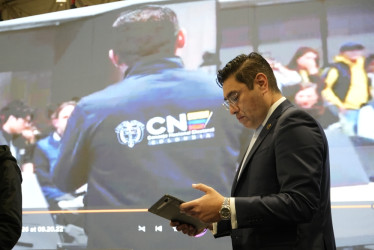 El presidente del CNE, magistrado Cristian Quiroz, antes de entregar el balance del escrutinio de las votaciones de colombianos en el exterior, correspondientes a las elecciones del 8 de marzo.