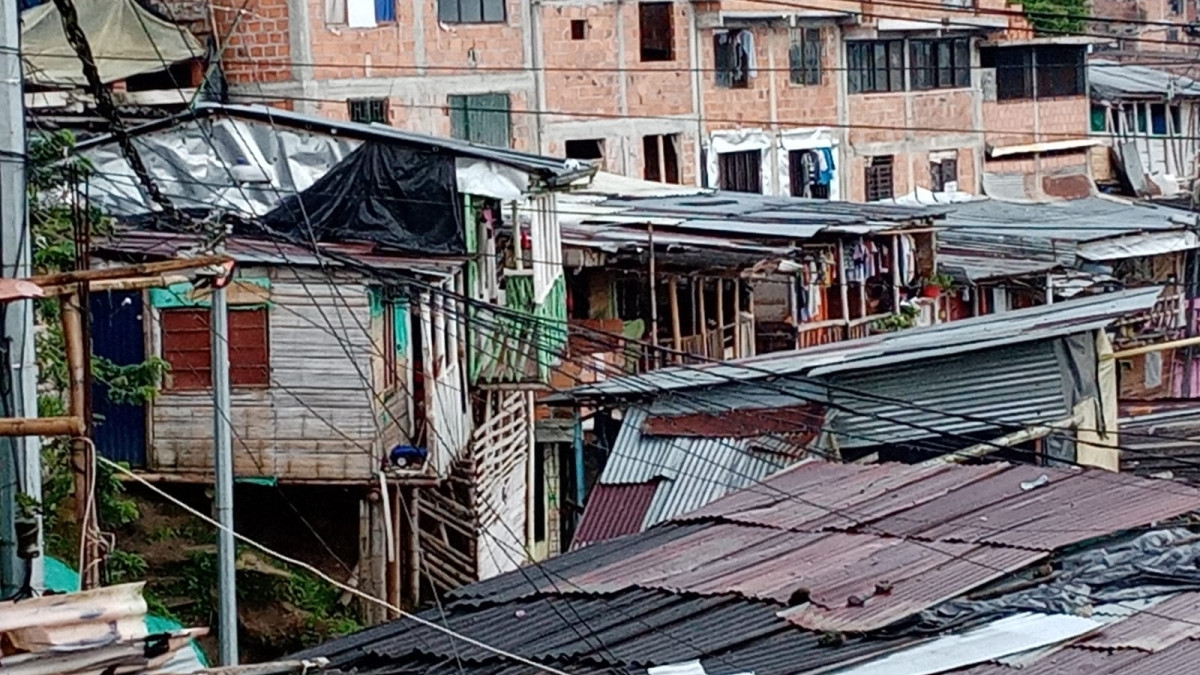 La casa de la menor (verde).