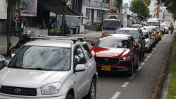 Un Día con los mismos carros y motos 