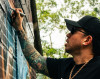 Artistas de Pereira realizan mural en honor a De la Ghetto: el reguetonero firmó la obra